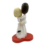 Bobblehead da matrimonio, sposa che trasporta lo sposo