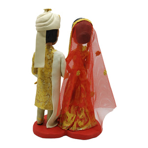 Bambola bobblehead a forma di coppia di sposi indiani