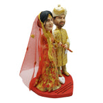 Bambola bobblehead a forma di coppia di sposi indiani