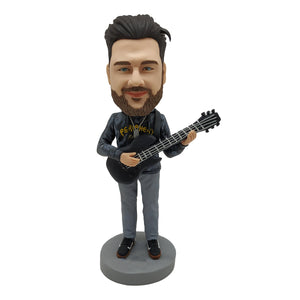 Bambola Bobblehead per gli amanti della musica con chitarra