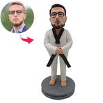 Statuetta con testa oscillante di un atleta di Taekwondo