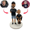 Bobblehead barbiere con bambino