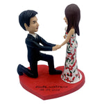 Bambola Bobblehead con proposta personalizzata