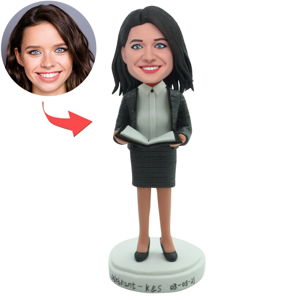 Bobblehead personalizzati da insegnante donna con abito nero da lavoro