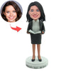 Bobblehead personalizzati da insegnante donna con abito nero da lavoro