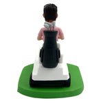 Idea regalo per la festa del papà: Bobblehead che guida un golf cart