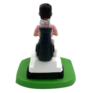 Idea regalo per la festa del papà: Bobblehead che guida un golf cart