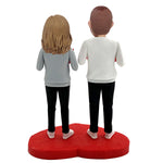 Bobblehead di coppia personalizzato con la scritta "AMORE"