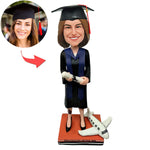 Bobblehead personalizzato per laurea con modello di aeroplano