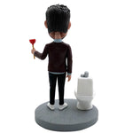 Bobblehead personalizzato e divertente che stura il water