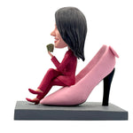 Bobblehead personalizzato raffigurante una donna elegante seduta sui tacchi alti