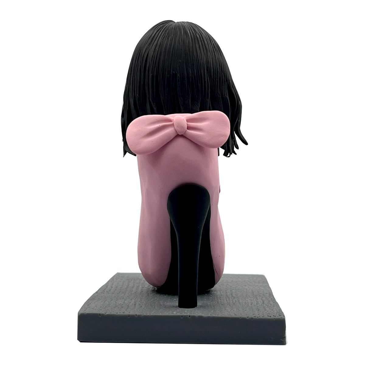 Bobblehead personalizzato raffigurante una donna elegante seduta sui tacchi alti
