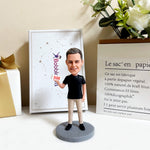 Bobblehead personalizzato con uomo che tiene il cartello BOSS