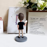 Bobblehead personalizzato con uomo che tiene il cartello BOSS