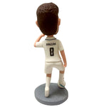 Bobblehead personalizzato di giocatore di football in maglia bianca