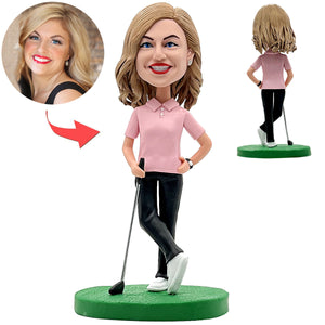 Bobblehead di golfista felice con maglietta rosa