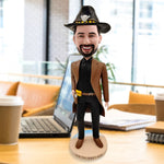 Bambola bobblehead da cowboy