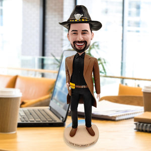 Bambola bobblehead da cowboy