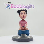 Bobblehead personalizzati con donne umoristiche sedute sul water