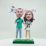 Bobblehead personalizzato di coppia che gioca a golf